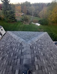 Complete roof transformation by Garlow Roofing—old, worn-out roofing replaced with a durable, high-quality system built to last.